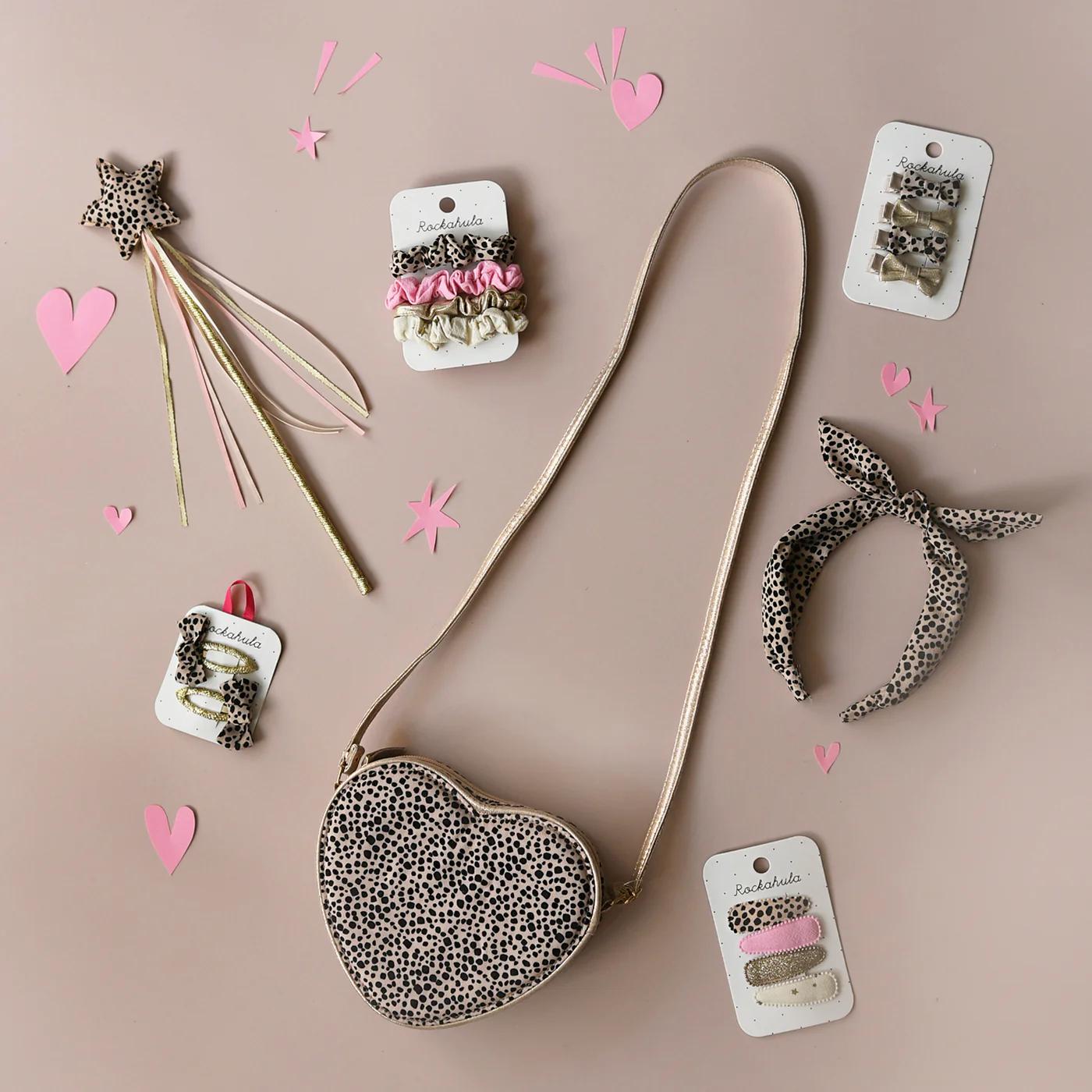 BOLSO DE LEOPARDO CON CORAZON DE AMOR