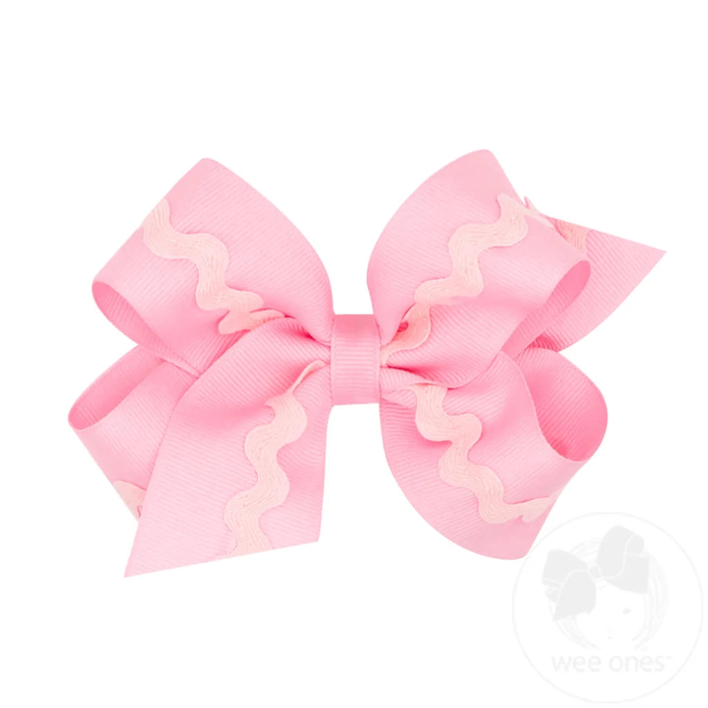 Lazo mediano para el cabello de grosgrain con ribete de zigzag rosa