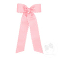Pajarita mediana de grosgrain con punto lunar, nudo envolvente y cintas decorativas rosa