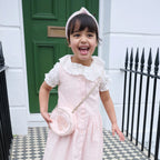Bolso redondo con zapatillas de ballet